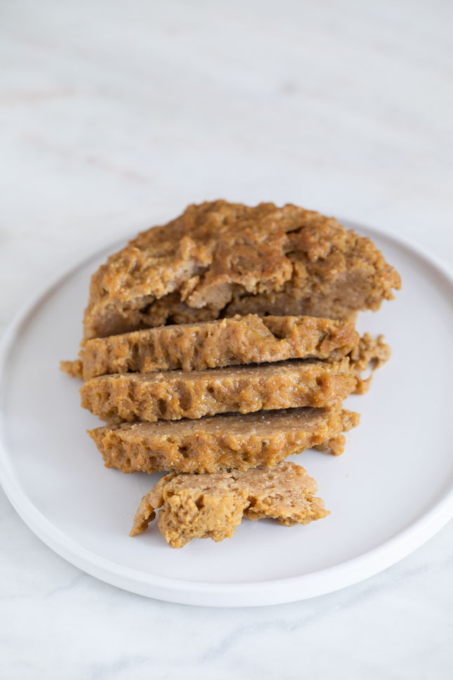 A photo of a dish plate with some seitan slices