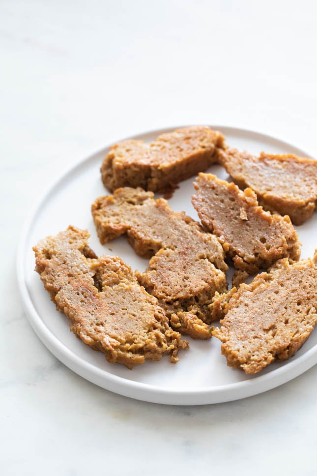 A overhead shot of a dish with seitan slices