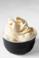 Photo of a bowl of homemade vega buttercream frosting