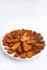 Photo of a plate of tempeh bacon